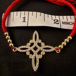 Beautiful Witch’s Knot on Adjustable Red Bracelet